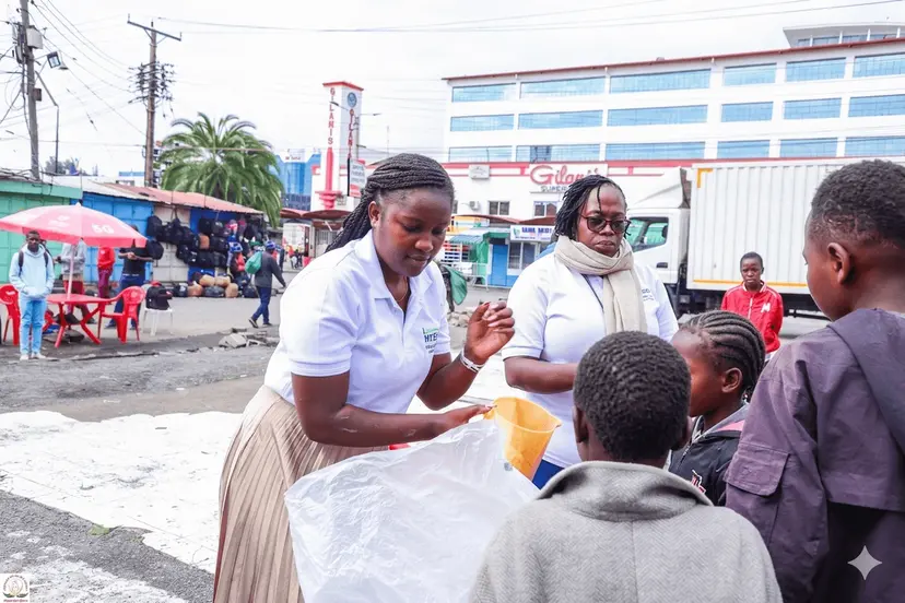 Clothing distribution - volunteers handing out clothes